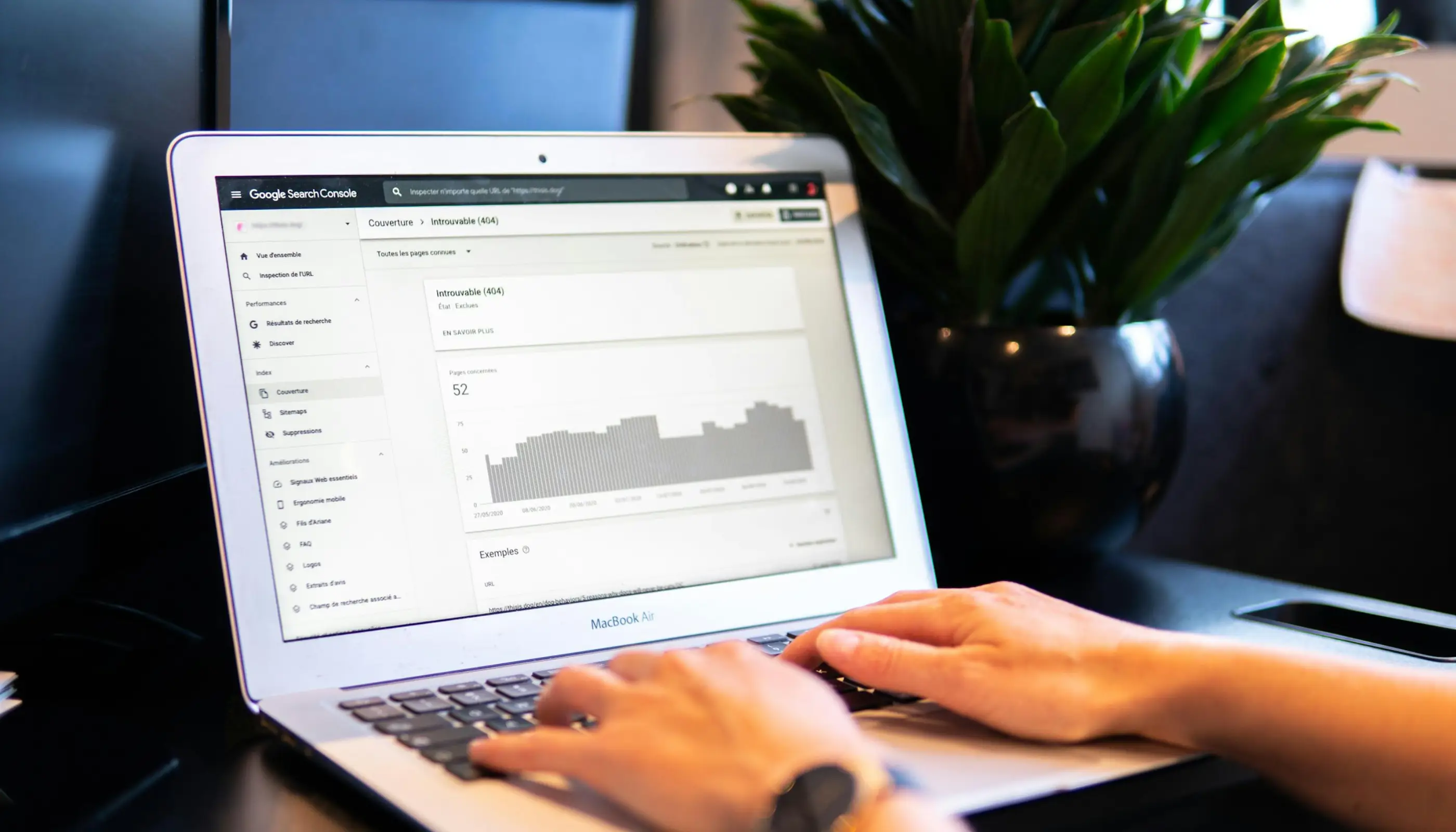 person performing SEO analysis on a laptop